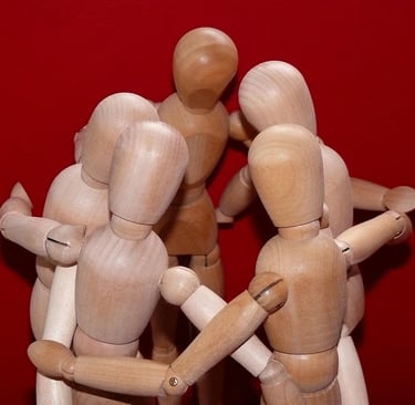 wooden figures in a collectivist cluster