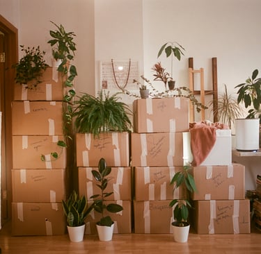 a neatly organised set of boxes suggesting someone is moving house
