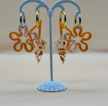 a pair of scissors and scissors on a stand