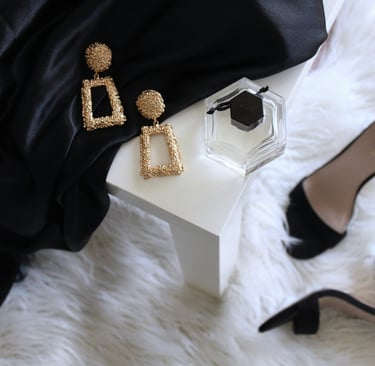 beauty-accessories-on-the-table-with-heels-on-floor
