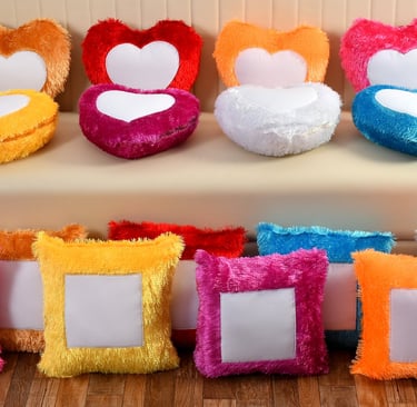 a couch with a bunch of pillows and a couch with a heart shaped picture frame