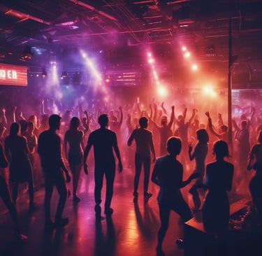 A crowd enjoying an outdoor indie music event at sunset.