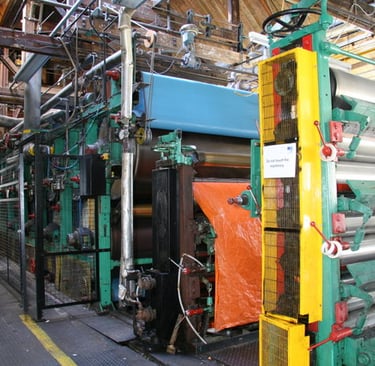 a machine that is making a paper towel