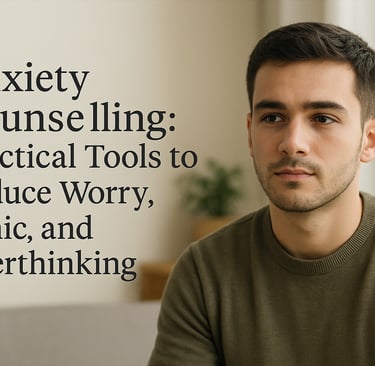 a thoughtful young man in his 20s, seated indoors in soft natural light