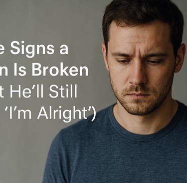 Reflective man in a blue shirt next to blog text about emotional signs men are silently struggling.