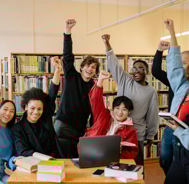 group-of-students-raising-their-hands-for-success