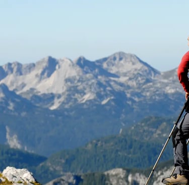 a man with a backpack on a mountain