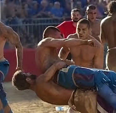 a man is wrestling with another man in the background, calcio fiorentino