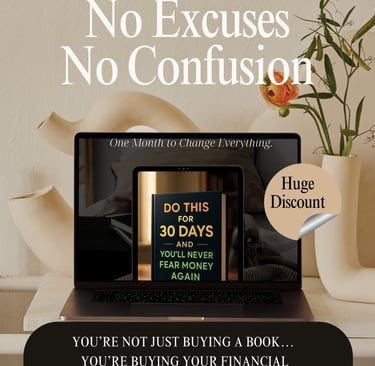 a laptop computer sitting on a desk with a vase of flowers