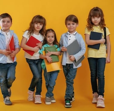 a group of children holding books and bookshelves