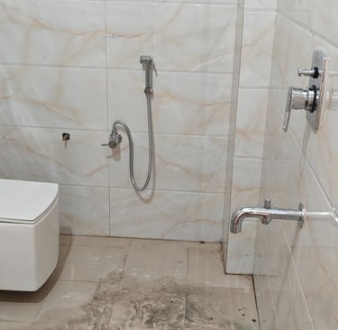 a bathroom with a toilet and a toilet paper towel