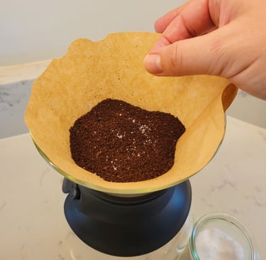 sprinkle of salt on coffee grounds