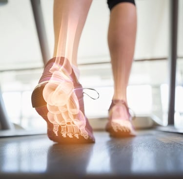 a person walking on a treadmill with a foot on a tread