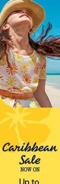 a woman in a hat and a hat on a beach