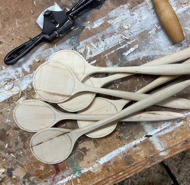 In progress hand-carved wooden spoons
