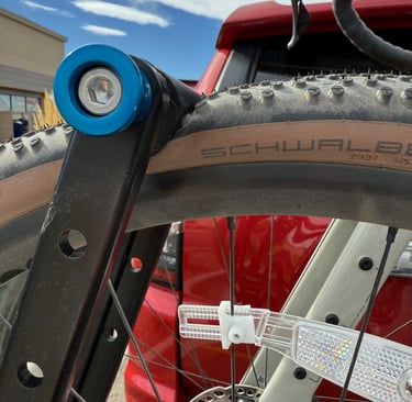 Close up of flat tire mounted on bike rack