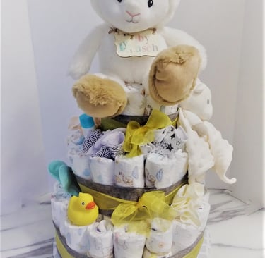 Diaper cake with stuffed animal