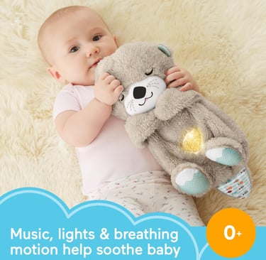 baby with otter toy