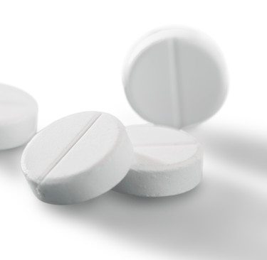 White Letrozole fertility medication pills on a white background
