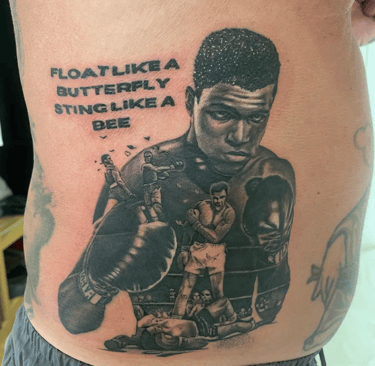 a picture of realistic Muhammed Ali tattoo with a quote from a customer