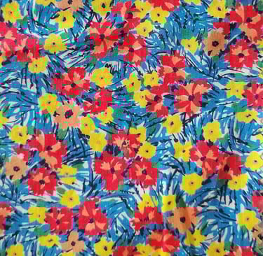 a colorful floral print fabric with a blue and yellow background