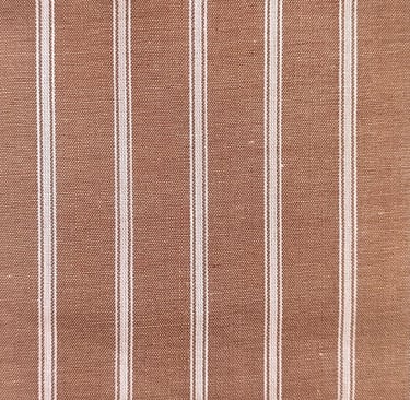 a striped brown and white striped fabric with a white stripe