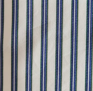a close up of a striped shirt with a blue and white striped shirt