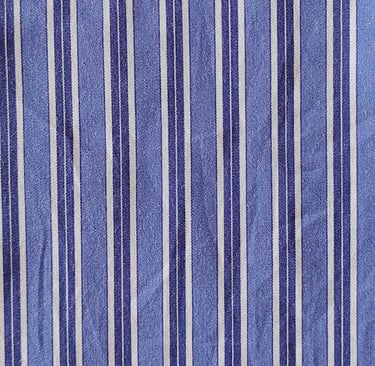 a blue and white striped shirt with a tie