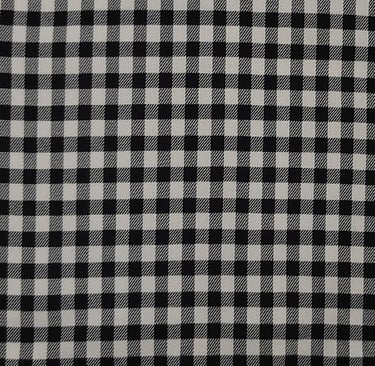 a black and white checkered plaid fabric with a black and white checkered