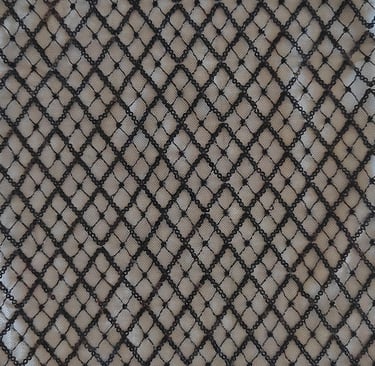 Square patterned fabric made with black beads