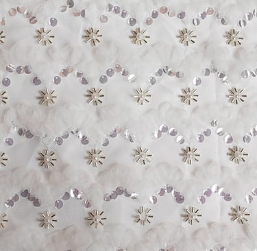 Lace fabric with embroidered sequins and tube beads