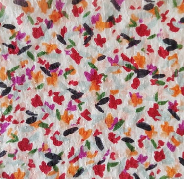 a close up of a colorful floral print fabric