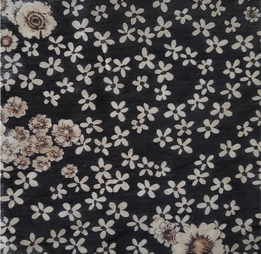 a black and white floral rug with a black and white floral pattern