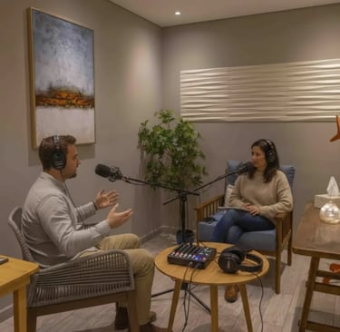 a man and woman sitting in a room