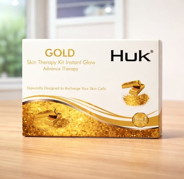 Huk Gold Skin Therapy Kit for instant glow and cell recharge in a luxury white and gold box.