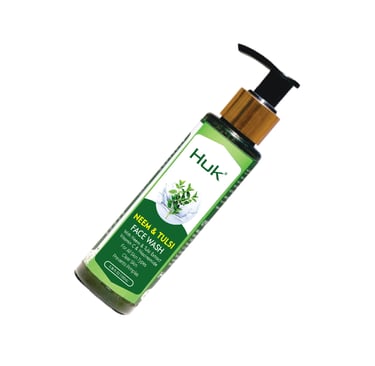 a bottle of green tea tree oil