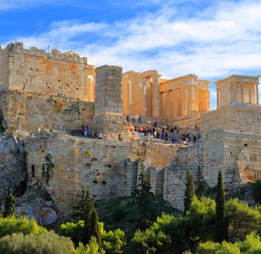 Tourists walking around the Acropolis in Athens with fewer crowds in September