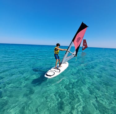 Leçon de planche à voile à lozari, Corsica