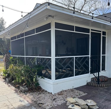 Custom screen system on a Pawleys Island porch for outdoor comfort.