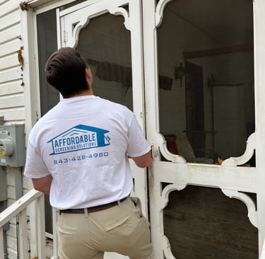 Custom screen door installation on a modern home in Myrtle Beach
