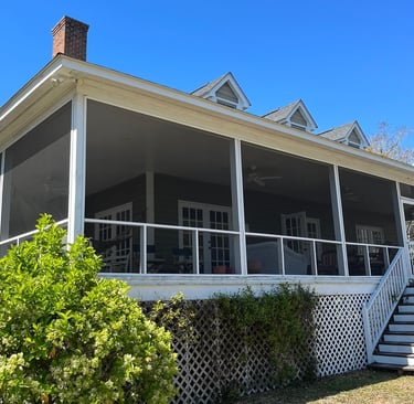 Beautiful screen porch with a great view.