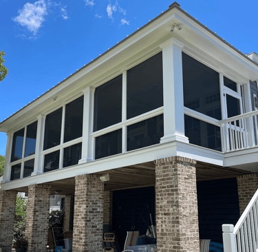 Beautiful screen porch in Charleston overlooking the inlet.