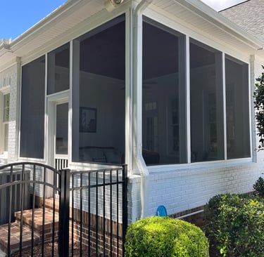 Beautifully constructed screen porch offering protection from insects.