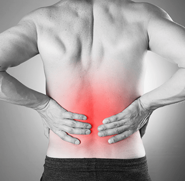 a man with a back pain in a pain