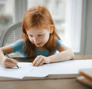 A young girl works at her own pace. 