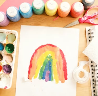 A child creates beautiful artwork at home.