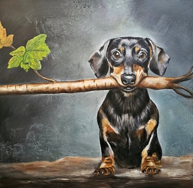 Dackel mit einem kleinen Baum im Maul