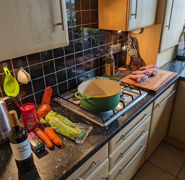 a kitchen counter top with a bowl of vegetables