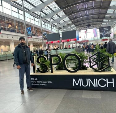 a man standing in front of a sign that says spot spot