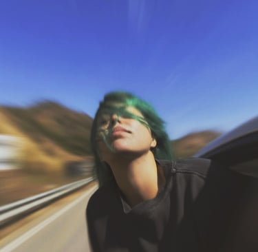 a woman with green hair and green hair